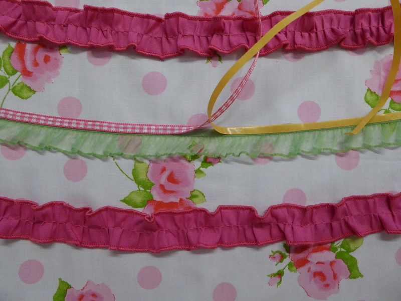 using_a_2_needle_narrow_to_attach_ribbons_and_ruffles.jpg